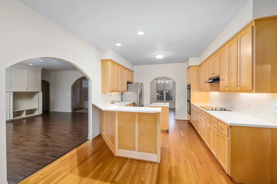 Kitchen with wood cabinets